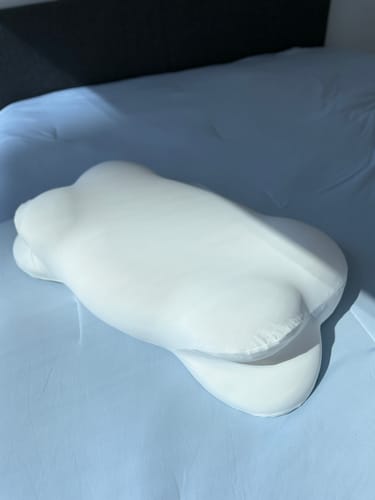 CloudAlign pillow photographed by Emma C.